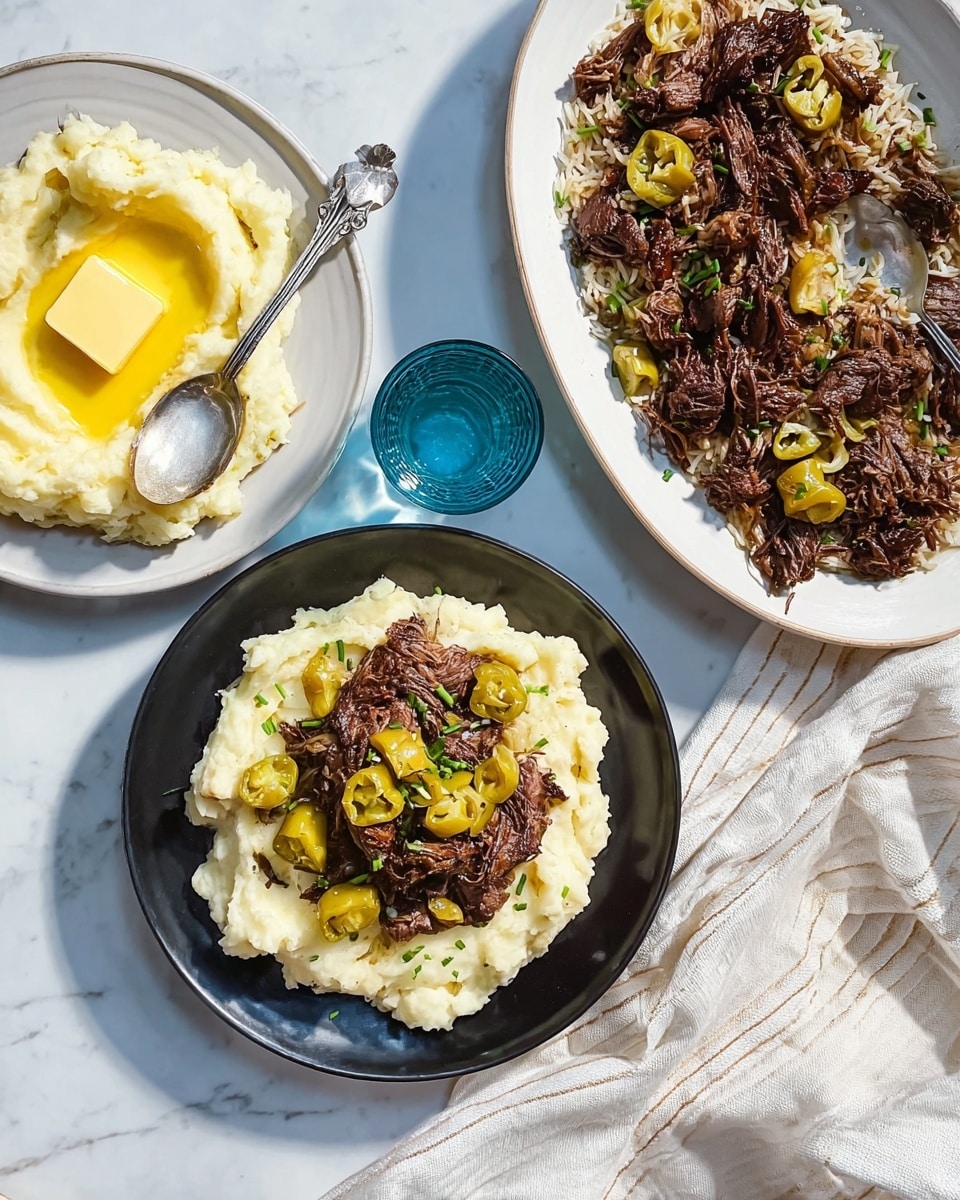 A black round plate with a layer of creamy white mashed potatoes topped with shredded dark brown beef and several whole light green peppers scattered on top, garnished with small green herb bits. To the left, a white plate holds a thick layer of mashed potatoes with a square piece of melting yellow butter in the middle and a silver spoon resting on the side. Above, a large oval white plate filled with a large amount of shredded dark brown beef mixed with rice and light green peppers, with a silver spoon placed inside. There is a clear blue water glass between the plates and a white cloth with light beige stripes to the right on a white marbled surface. Photo taken with an iphone --ar 4:5 --v 7