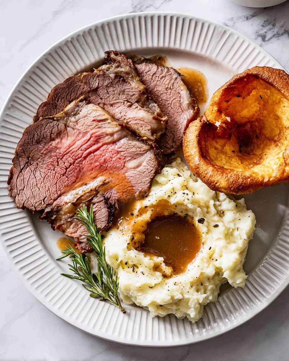 A roasted beef cut is placed on a wooden board, showing a dark, crispy outer layer and a few thick slices laid flat in front of the main piece. The slices reveal a warm pink center with a tender, juicy texture, and a light brown outer cooked edge. In the background, a rack of ribs with a browned surface is resting beside the roast. A silver carving fork and knife with black handles lie on the white marbled surface below the board. Photo taken with an iphone --ar 4:5 --v 7