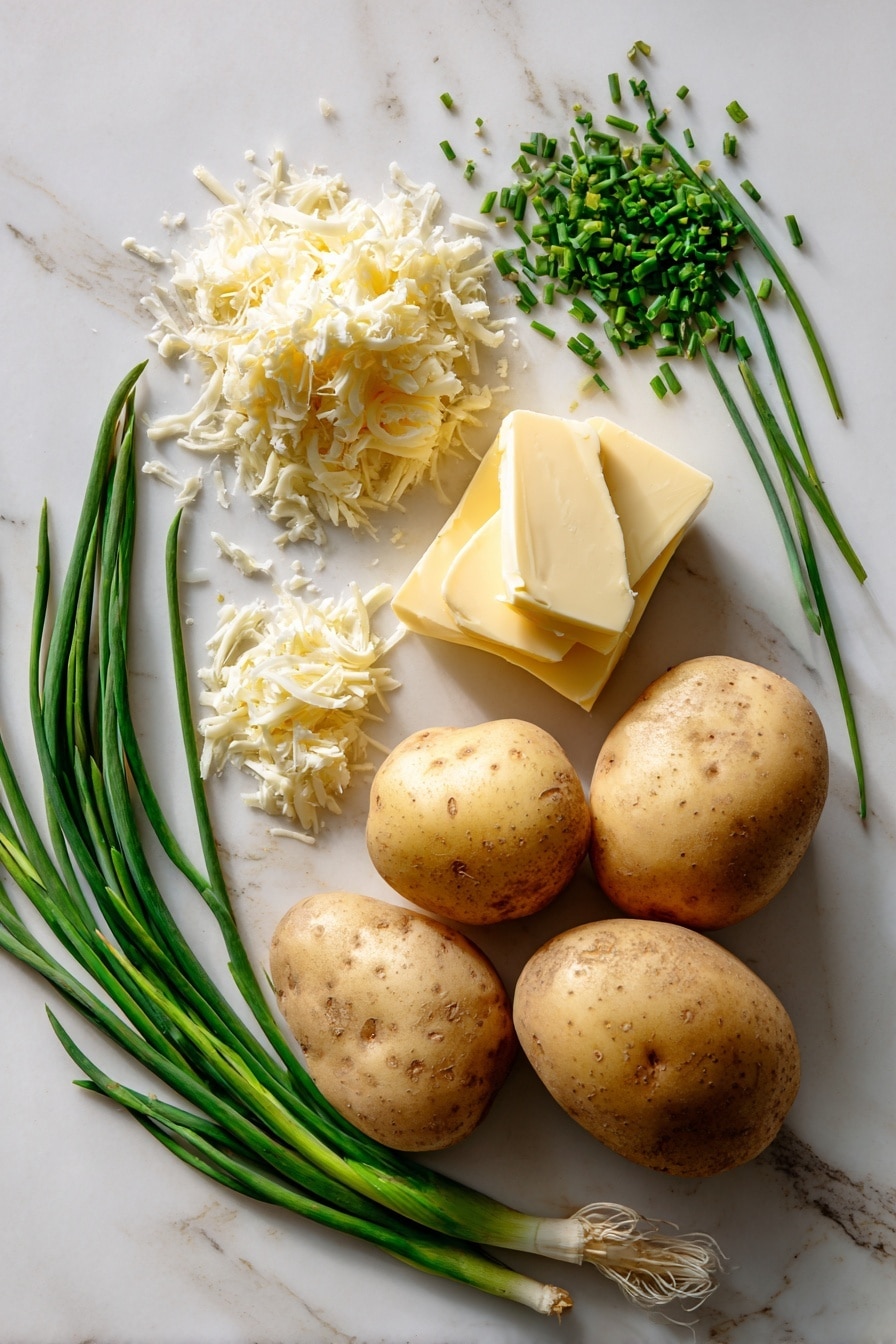 Flat lay of peeled russet and Yukon gold potatoes with smooth creamy yellow and pale golden hues, rich golden butter slabs glistening softly, a small mound of finely grated ivory manchego cheese with textured curls, fresh bright green chopped chives scattered delicately nearby, and a few whole green chive stalks adding height and freshness, all naturally arranged in a loose, organic pattern with soft shadows, placed on white marbled surface, photo taken with an iphone --ar 2:3 --v 7 - Manchego Whipped Potatoes, creamy mashed potatoes with Manchego cheese, elegant potato side dish, nutty cheese mashed potatoes, gourmet mashed potato recipe
