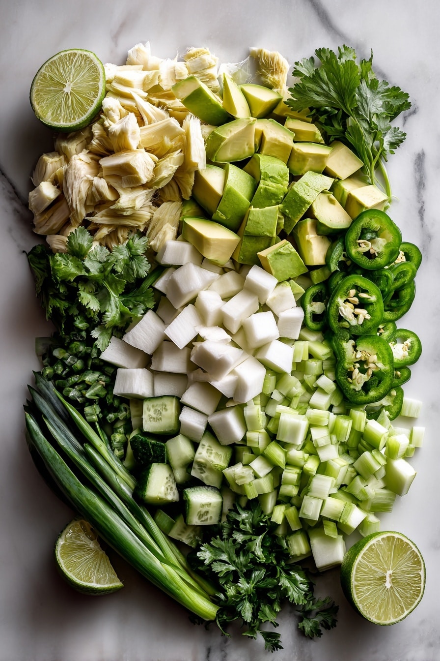 Flat lay of chopped jackfruit pieces, diced green apple, cubed ripe avocado, chopped baby cucumber, sliced green pepper, thinly sliced green onions, minced jalapeno pepper, fresh cilantro leaves, and lime wedges beautifully arranged with vibrant colors and fresh textures, placed on a white marble surface, photo taken with an iphone --ar 2:3 --v 7 - Jackfruit Tacos with Green Apple Salsa, plant-based tacos, vegan taco recipes, healthy vegetarian tacos, fresh fruit salsa recipes