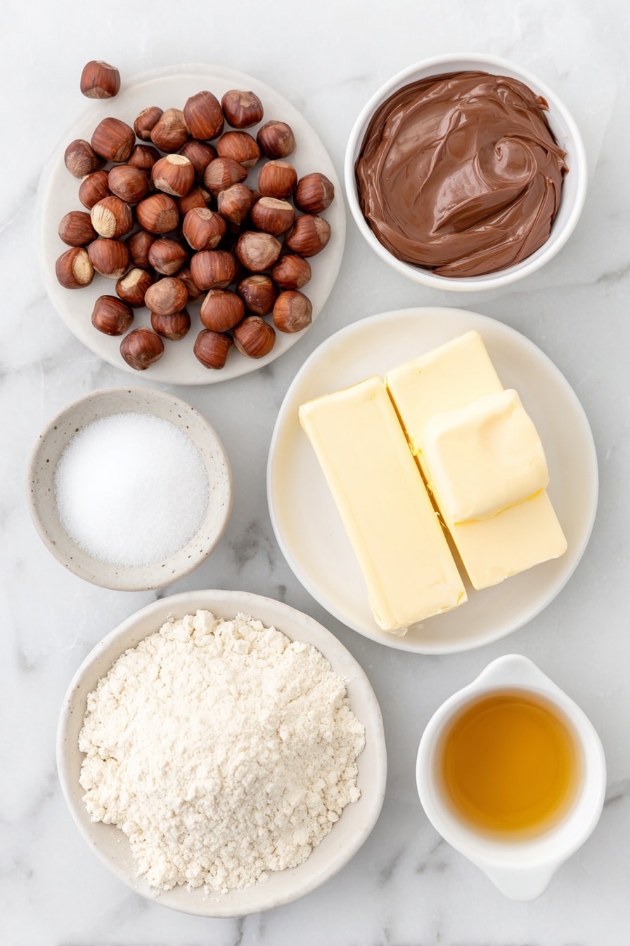Flat lay of whole uncracked brown hazelnuts spilling from a small pile, six smooth dollops of glossy Nutella arranged neatly on white parchment, two sticks of pale yellow unsalted butter with creamy texture, a small white ceramic bowl filled with fine white confectioners’ sugar, a few crystals of coarse kosher salt scattered beside a tiny white bowl of more salt, a small white bowl containing clear pale golden vanilla extract, a neat mound of pale beige all-purpose flour on a simple white ceramic plate placed symmetrically, all ingredients separated and balanced perfectly in a professional flat lay, placed on a clean white marble surface, soft natural light, photo taken with an iPhone, professional food photography style, fresh ingredients, white ceramic bowls, no bottles, no duplicates, no utensils, no packaging --ar 2:3 --v 7 --p awthu7i m7354615311229779997 - Nutella Snowball Cookies, Nutella Snowball Cookies recipe, chocolate Nutella cookies, easy Nutella cookies, holiday Nutella desserts