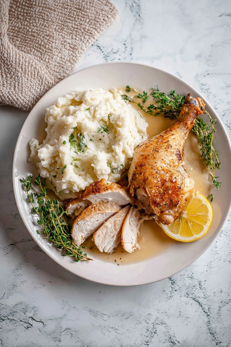 A whole roasted chicken with golden brown, slightly crispy skin speckled with small dark spices lies centered on a white plate. The chicken's legs and wings are tucked close to its body, showing a textured, seasoned surface. In front of the chicken is a bright yellow lemon wedge and several fresh, green herb sprigs that add a pop of color. The plate is placed on a white marbled surface, and the background is soft and out of focus, making the chicken the main focus. photo taken with an iphone --ar 2:3 --v 7 - Instant Pot Whole Chicken with Gravy, easy Instant Pot chicken recipe, juicy pressure cooker chicken, one-pot chicken dinner, homemade gravy recipe