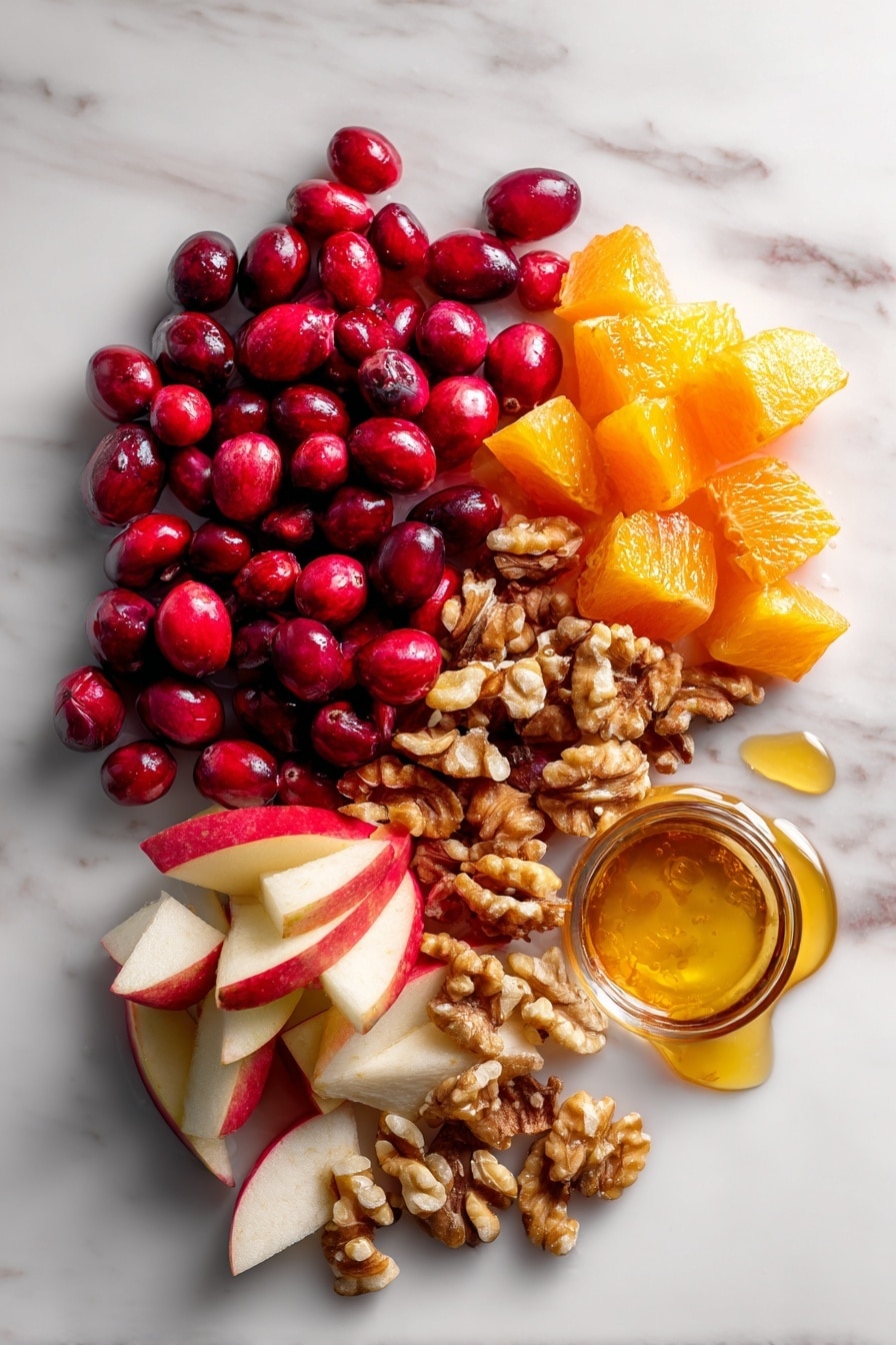 Flat lay of bright red fresh cranberries, glossy orange chunks with peel, crisp apple pieces with skin on, toasted shelled walnuts with a golden brown hue, and a small drizzle of golden honey glistening beside a tiny puddle of amber orange liqueur, all beautifully arranged in clusters to highlight their colors and textures, placed on a white marble surface, photo taken with an iphone --ar 2:3 --v 7 - Cranberry Orange Relish, holiday cranberry relish, festive citrus cranberry sauce, easy cranberry orange side dish, flavorful Thanksgiving relish