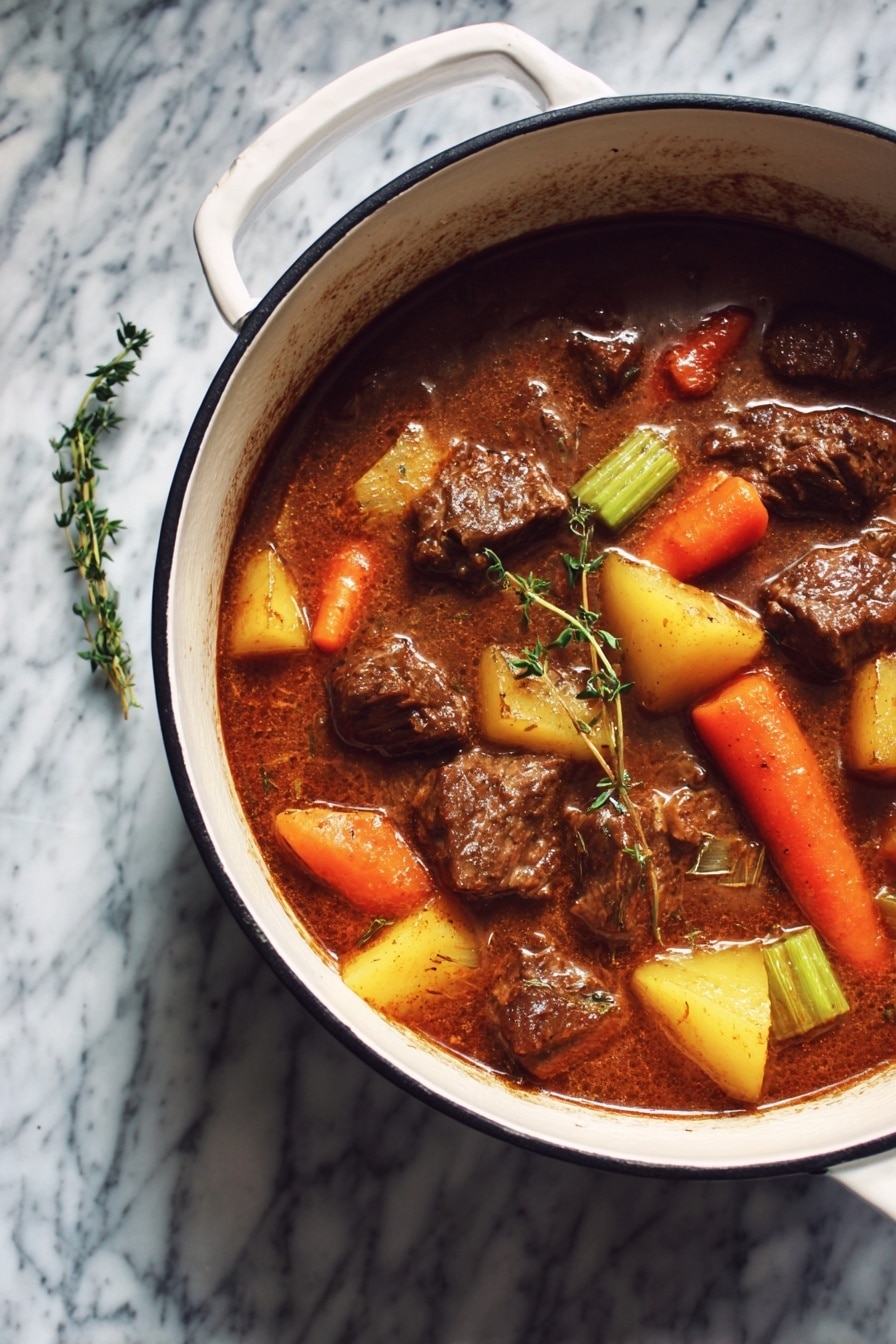 A blue pot filled with thick brown stew containing large chunks of tender dark brown meat, orange carrot pieces, light yellow potato chunks, and light green celery in a rich brown broth, with a small green sprig of thyme floating on the left side. The pot is placed on a wooden surface with a beige striped cloth beside it, holding a large silver ladle. photo taken with an iphone --ar 2:3 --v 7 - Apple Cider Beef Stew, hearty beef stew with apple cider, cozy apple cider beef recipe, easy beef stew with apple cider, comfort food beef stew