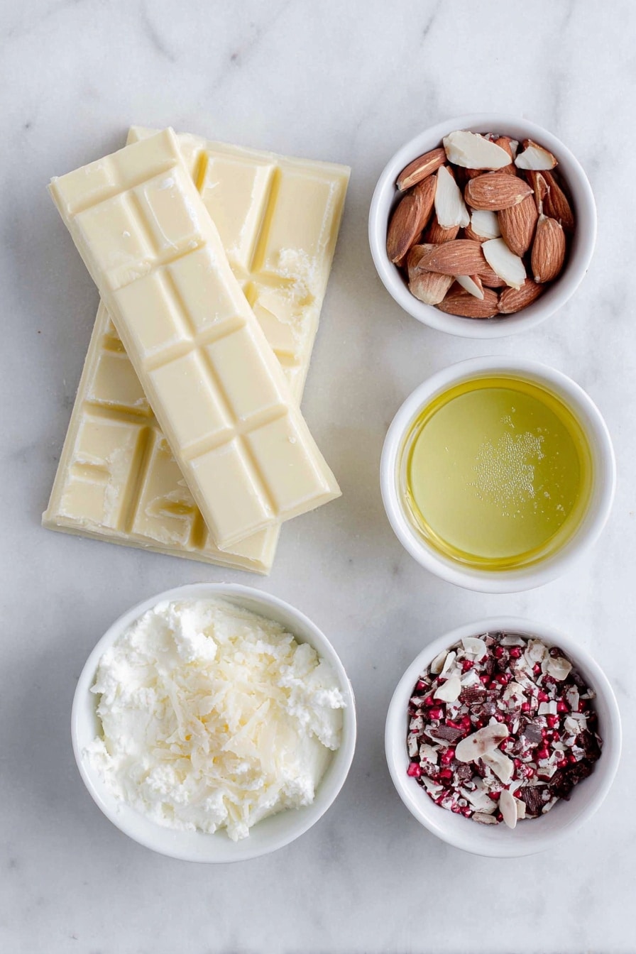 Flat lay of a solid block of milk chocolate, a small white bowl of heavy whipping cream, a small white bowl with clear almond extract, a small white bowl filled with chopped almonds, a solid bar of white chocolate, and two small white bowls each containing melted red and green candy melts, all arranged symmetrically and naturally fresh, placed on a clean white marble surface, soft natural light, photo taken with an iPhone, professional food photography style, fresh ingredients, white ceramic bowls, no bottles, no duplicates, no utensils, no packaging --ar 2:3 --v 7 --p m7354615311229779997 - Chocolate Almond Truffles, chocolate almond candies, easy homemade truffles, decadent chocolate treats, almond chocolate confections