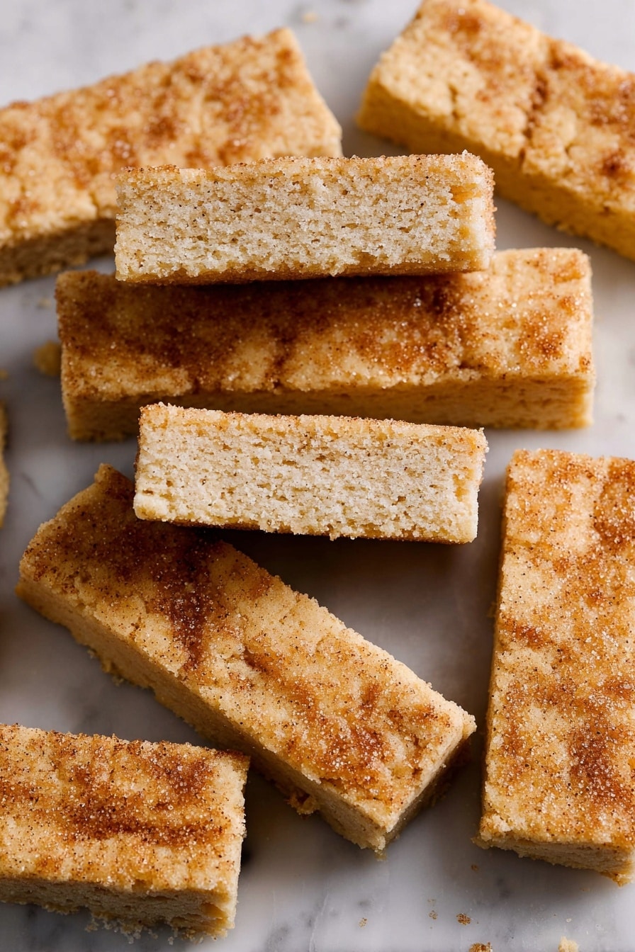 The image shows several rectangular pieces of golden brown crumbly bars laid out on a white marbled surface. Each bar has a rough, crumbly texture on top with a slightly darker, caramelized layer giving them a shiny appearance. The bars are close to equal in size, stacked tightly, with a few pieces stacked on top showing the dense, pale yellow interior that looks soft and slightly grainy. There is no visible plate or bowl, just the bars directly on the surface. photo taken with an iphone --ar 2:3 --v 7 - Ted Lasso Biscuit Shortbread, easy shortbread cookies, buttery shortbread recipe, fan-favorite shortbread, tea-time biscuit ideas