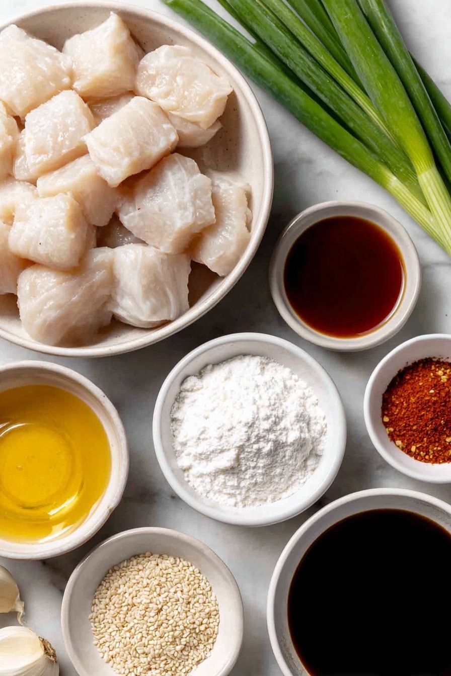 Flat lay of fresh cubed boneless skinless chicken breasts in a simple white ceramic bowl, a small white bowl of fine cornstarch powder, a small white bowl filled with dark glossy hoisin sauce, a small white bowl of deep amber soy sauce, a small white bowl of packed brown sugar, three whole uncracked garlic cloves beside a few minced garlic pieces, a small white bowl of clear rice wine vinegar, a small white bowl with golden sesame oil, a small white bowl of light brown dry ground ginger powder, a small white bowl of crushed red pepper flakes, a few fresh green onions with bright green tops and white bulbs, a small white bowl of white sesame seeds, all arranged with perfect symmetry and balanced proportions, placed on a clean white marble surface, soft natural light, photo taken with an iPhone, professional food photography style, fresh ingredients, white ceramic bowls, no bottles, no duplicates, no utensils, no packaging --ar 2:3 --v 7 --p m7354615311229779997 - Slow Cooker General Tso’s Chicken, Chinese chicken recipes, easy slow cooker dinner, homemade General Tso’s chicken, family-friendly Chinese dishes