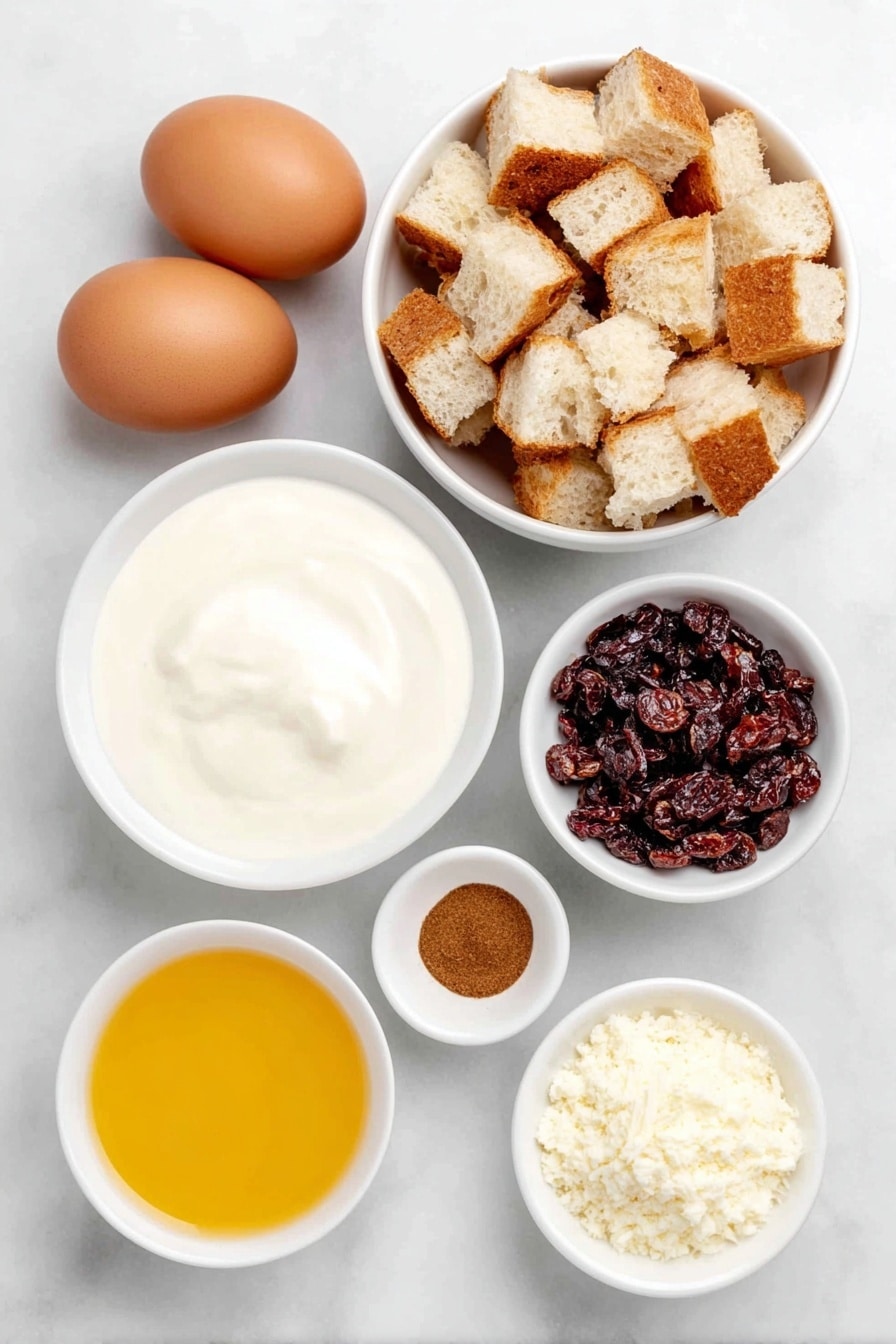 Flat lay of four large whole brown eggs with clean shells, a small white ceramic bowl of heavy cream, a small white ceramic bowl with bright orange fresh orange juice, a small white ceramic bowl filled with dried red cranberries, a larger simple white ceramic bowl holding cubed rustic crusty French baguette pieces, and a small white ceramic bowl containing a warm-toned ground spice mix of cinnamon, ginger, all-spice, cloves, nutmeg, and a pinch of salt, all arranged in perfect symmetry and balanced proportions, placed on a clean white marble surface, soft natural light, photo taken with an iPhone, professional food photography style, fresh ingredients, white ceramic bowls, no bottles, no duplicates, no utensils, no packaging --ar 2:3 --v 7 --p m7354615311229779997 - Gingerbread French Toast Casserole, holiday breakfast casserole, make-ahead breakfast ideas, cozy holiday morning recipes, spiced breakfast bake