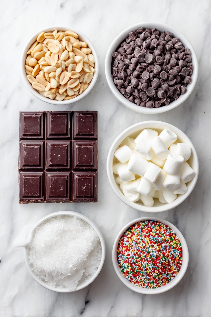 Flat lay of a small mound of lightly salted dry roasted peanuts, broken chunks of vanilla almond bark arranged neatly, a small white bowl filled with semisweet chocolate chips, broken pieces of a dark chocolate bar, a small white bowl heaped with mini marshmallows, and a small white bowl with colorful sprinkles, each ingredient fresh and natural, all placed with perfect symmetry on simple white ceramic bowls, placed on a clean white marble surface, soft natural light, photo taken with an iPhone, professional food photography style, fresh ingredients, white ceramic bowls, no bottles, no duplicates, no utensils, no packaging --ar 2:3 --v 7 --p m7354615311229779997 - Crockpot Chocolate Peanut Candy, easy candy recipes, no-bake chocolate peanut treats, party candy ideas, homemade sweet gifts