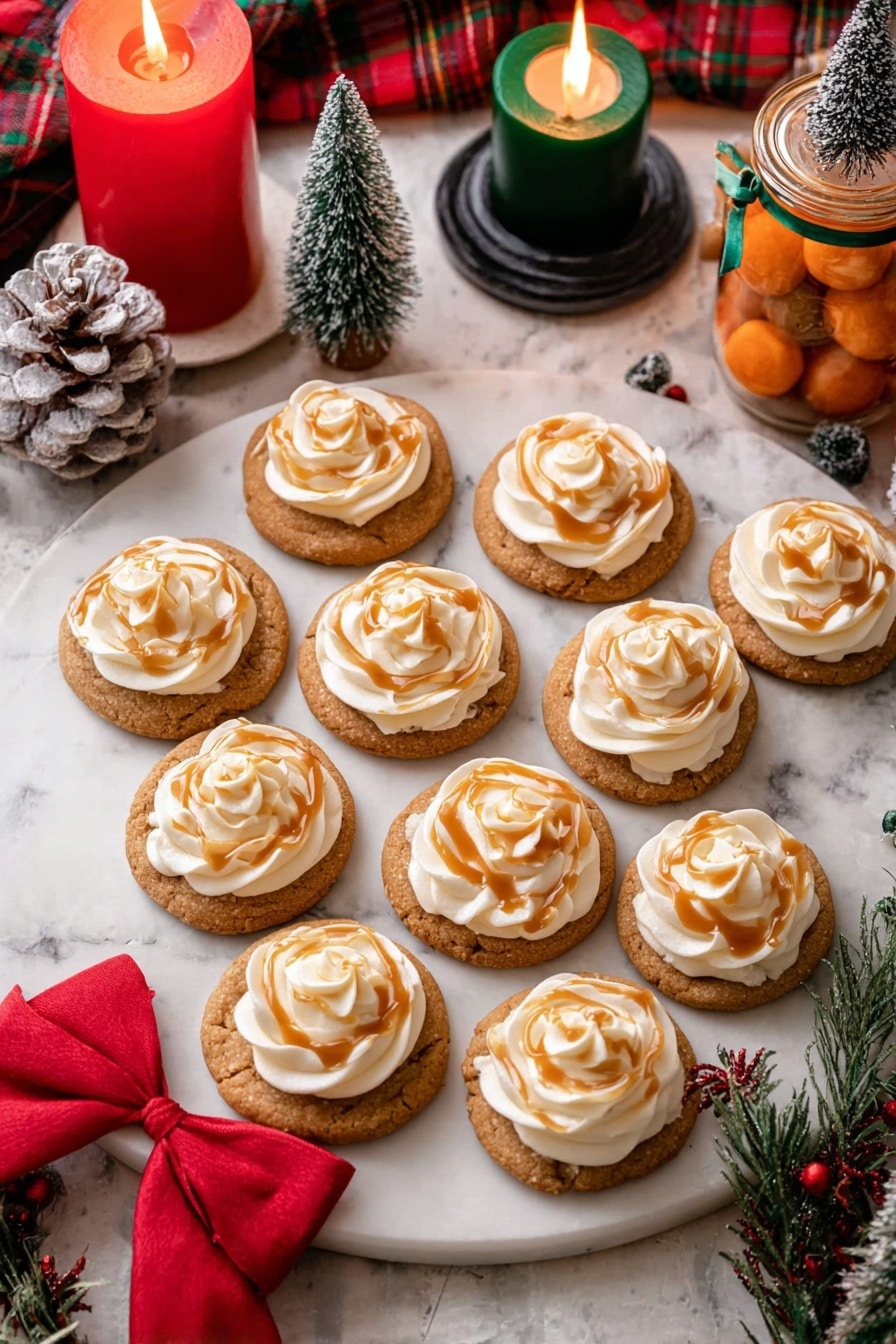 Twelve round cookies lie on a white marble tray, each cookie topped with a swirl of light cream frosting in a rose shape drizzled with shiny caramel sauce. The cookies are golden brown with a slightly rough texture, and the frosting is smooth and creamy in a pale cream color. Around the tray are small festive decorations including a red bow on the front edge, a pinecone dusted with white, a green candle with a small flame, a red candle with a bright flame in a black holder tied with a red ribbon, small green Christmas trees with white tips, and a jar tied with a green ribbon filled with orange-colored contents. The tray and decorations rest on a white marble surface with soft warm lighting giving a cozy holiday feel. Photo taken with an iphone --ar 2:3 --v 7 - Toffee Date Cookies with Creamy Frosting, decadent date cookie recipe, easy toffee dessert, soft chewy cookies with frosting, holiday cookie ideas