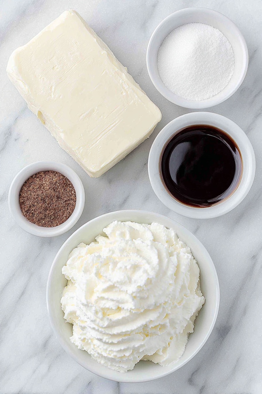 Flat lay of a block of cream cheese, a small white bowl of powdered sugar, a small white bowl of dark molasses, a small white bowl with ground ginger, a small white bowl with ground cloves, a small white bowl with ground cinnamon, and a bowl of fluffy thawed Cool Whip whipped topping, all arranged symmetrically on a clean white marble surface, soft natural light, photo taken with an iPhone, professional food photography style, fresh ingredients, white ceramic bowls, no bottles, no duplicates, no utensils, no packaging --ar 2:3 --v 7 --p m7354615311229779997 - Sweet Gingerbread Cheesecake Dip, festive holiday dip, easy gingerbread dip, creamy holiday appetizer, gingerbread flavored dip