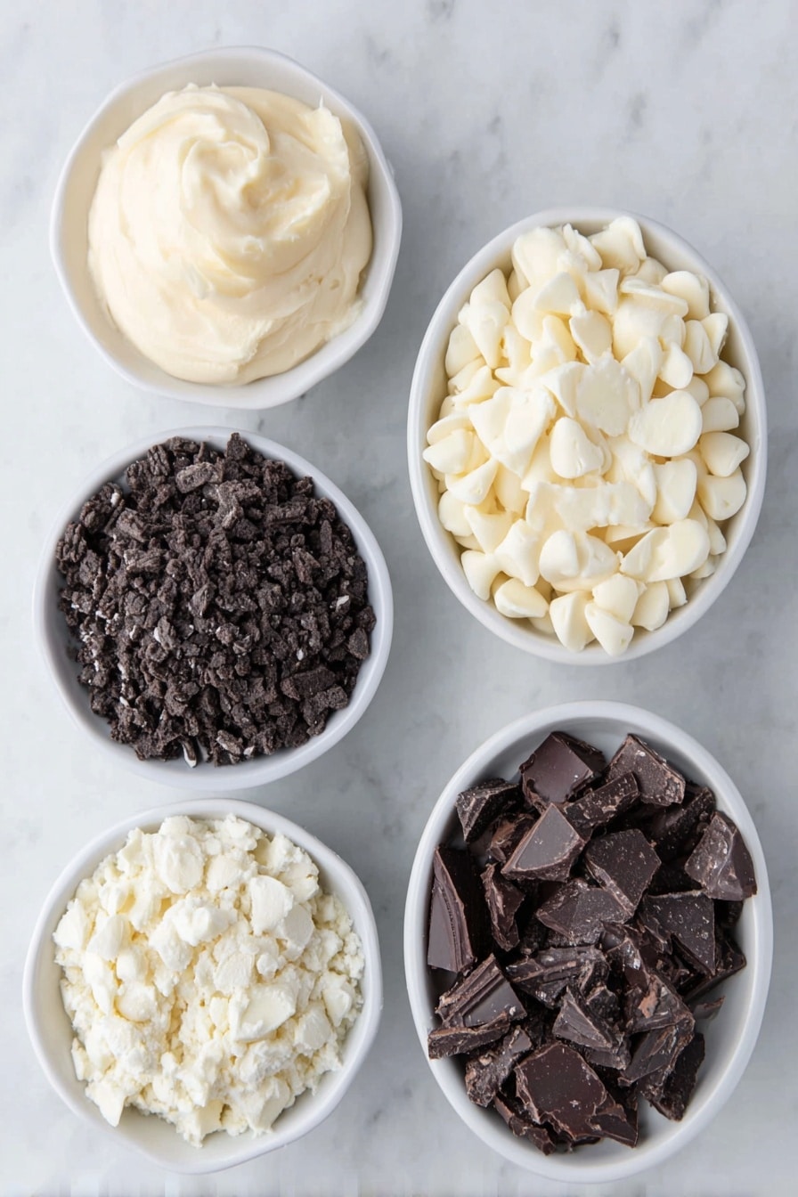 Flat lay of sweetened condensed milk in a small white ceramic bowl, a small white ceramic bowl filled with smooth white chocolate chips, a small white ceramic bowl with finely chopped Oreo cookies, and a small white ceramic bowl with larger pieces of chopped Oreo cookies, all arranged in perfect symmetry, placed on a clean white marble surface, soft natural light, photo taken with an iPhone, professional food photography style, fresh ingredients, white ceramic bowls, no bottles, no duplicates, no utensils, no packaging --ar 2:3 --v 7 --p m7354615311229779997 - Easy Oreo Fudge, Oreo Fudge, no-bake Oreo dessert, simple fudge recipe, quick Oreo treats