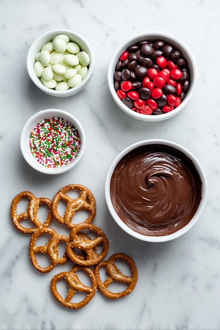 Flat lay of two small white ceramic bowls—one filled with smooth melted chocolate, the other with colorful red candy-coated chocolates (red M&Ms); a small white bowl with bright white candy eyeballs; several mini pretzel twists arranged neatly beside the bowls; a few small sprigs of assorted colorful holiday sprinkles scattered delicately nearby, all laid out in perfect symmetry on a clean white marble surface, soft natural light, photo taken with an iPhone, professional food photography style, fresh ingredients, white ceramic bowls, no bottles, no duplicates, no utensils, no packaging --ar 2:3 --v 7 --p m7354615311229779997 - Reindeer Chocolate Bark with Pretzels, holiday chocolate bark, festive Christmas treats, easy holiday snacks, reindeer dessert ideas