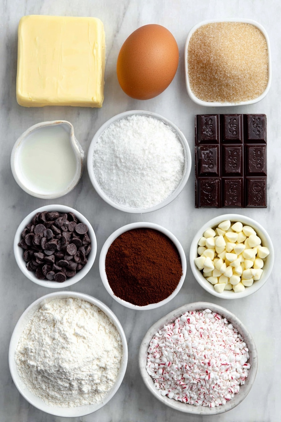 Flat lay of a small square of unsalted butter, a small mound of light brown sugar, a small mound of granulated sugar, one large whole brown egg with a clean shell, a small white ceramic bowl with vanilla extract, a small mound of all purpose flour, a small mound of unsweetened cocoa powder, a small pile of baking soda powder, a small pile of fine salt, a small white ceramic bowl with semi-sweet chocolate chips, a small white ceramic bowl with white chocolate chips, a few crushed peppermint candies scattered loosely, a small square of unsalted butter, a small white ceramic bowl filled with confectioners sugar, a small white ceramic bowl with milk, a small white ceramic bowl with peppermint extract placed on a clean white marble surface, soft natural light, photo taken with an iPhone, professional food photography style, fresh ingredients, white ceramic bowls, no bottles, no duplicates, no utensils, no packaging --ar 2:3 --v 7 --p m7354615311229779997 - Peppermint Bark Cookies, peppermint bark cookies recipe, holiday chocolate peppermint cookies, peppermint cookie recipe, festive peppermint treats