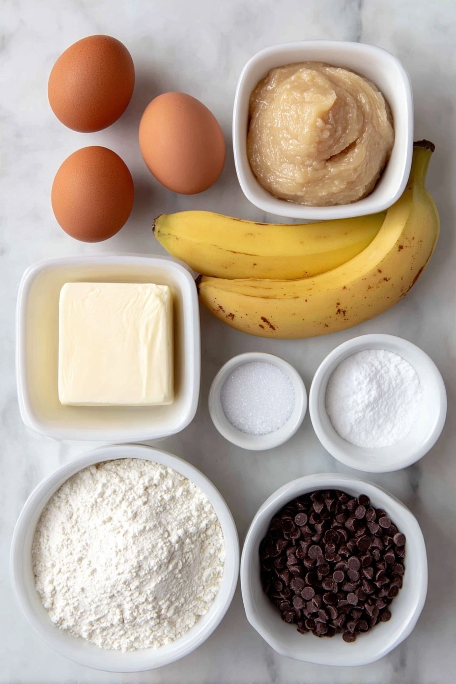 Flat lay of two whole uncracked brown eggs, a small bowl of light brown mashed banana, a few medium yellow bananas with some brown spots, a few semi sweet dark chocolate chips scattered beside a small white bowl filled with more semi sweet chocolate chips, a small white bowl with solid unsalted butter, a small white bowl of fine granulated white sugar, a small white bowl of deep brown Dutch processed cocoa powder, a small white bowl of pale all purpose flour, a tiny white bowl of fine white baking powder, a small white bowl of clear vanilla extract, and a tiny sprinkle of fine salt crystals arranged symmetrically and balanced on a clean white marble surface, soft natural light, photo taken with an iPhone, professional food photography style, fresh ingredients, white ceramic bowls, no bottles, no duplicates, no utensils, no packaging --ar 2:3 --v 7 --p m7354615311229779997 - Banana Chocolate Brownies, chocolate banana brownies, fudgy banana brownies, easy banana brownies, moist chocolate brownies