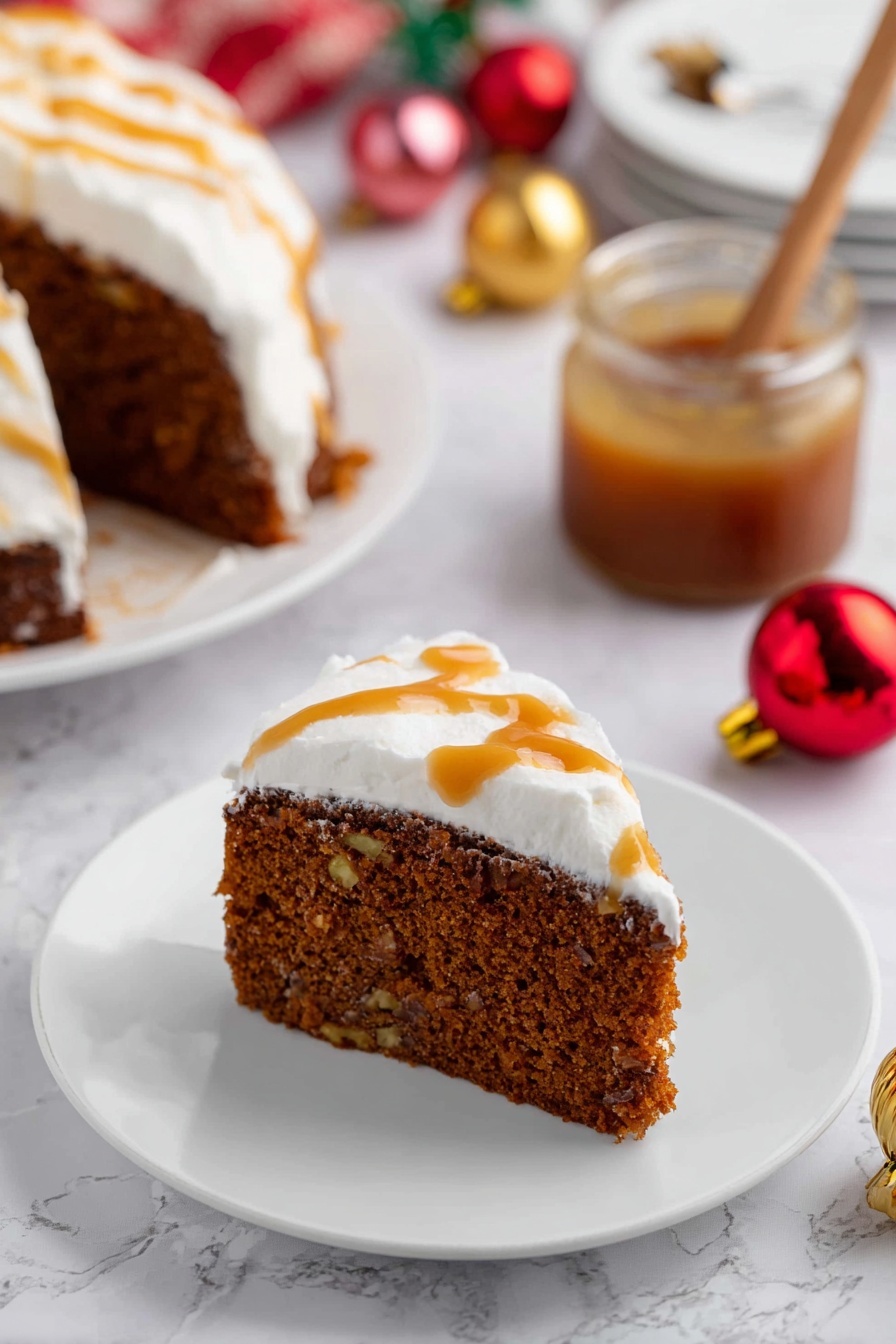 A round chocolate cake with one thick dark brown layer that looks moist and soft is topped with a thick layer of white whipped cream spread unevenly, showing some waves and curves. Golden caramel sauce is drizzled generously over the whipped cream and slightly runs down the sides of the cake. A slice is lifted by a silver spatula, showing the inside texture of the cake with the caramel sauce dripping down. The cake sits on a white marbled surface with a small glass jar of caramel sauce, red and gold Christmas ornaments, and a red and green plaid cloth blurred in the background. Photo taken with an iphone --ar 2:3 --v 7 - Gingerbread Cake Molasses, gingerbread cake recipe, holiday gingerbread cake, moist gingerbread cake with molasses, festive gingerbread dessert