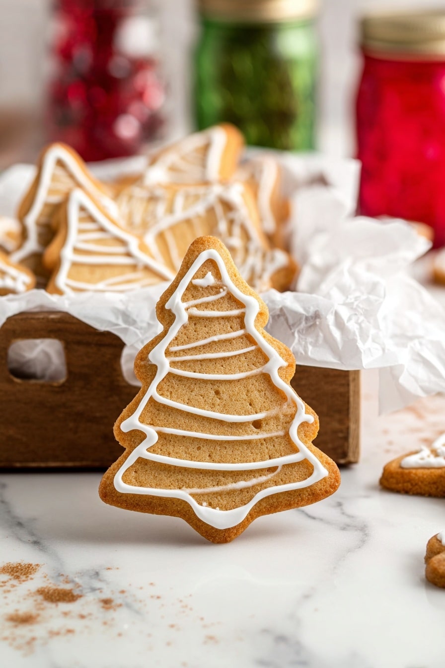 A stack of eight thick, square sugar cookies is shown on a white marbled surface. Each cookie is golden brown with a slightly crumbly texture and thin white icing piped neatly around the edges. The top cookie has a bite taken out of its side and is decorated with small white icing dots. The background includes blurred colorful glass objects in red, green, and yellow shades. Photo taken with an iphone --ar 2:3 --v 7 - Christmas Sugar Cookies with Icing, holiday sugar cookies, festive cookie recipe, Christmas cookie decorating, easy holiday cookies